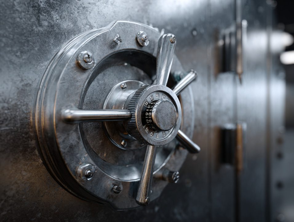 Large bank vault door with combination lock - professional security and locksmith services